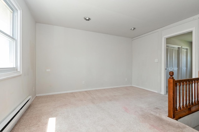 3645 177th Pl, Lansing, IL 60438 - carpeted spare room featuring baseboard heating and baseboards