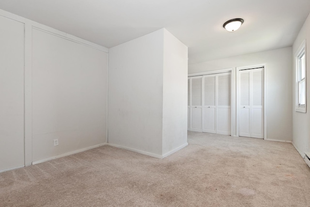 3645 177th Pl, Lansing, IL 60438 - unfurnished bedroom featuring carpet floors and two closets