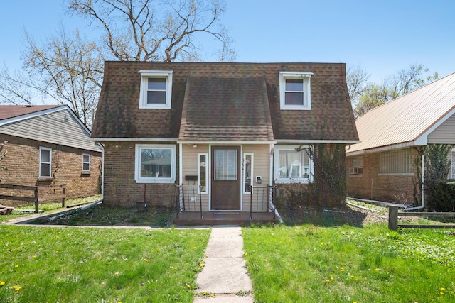 3645 177th Pl, Lansing, IL 60438 - view of front facade featuring a shingled roof, a front yard, and mansard roof