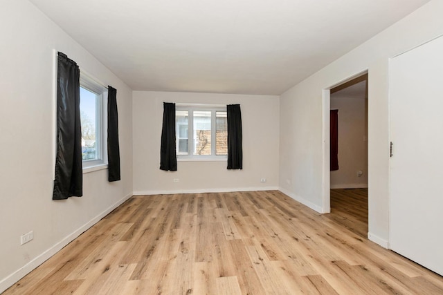 3645 177th Pl, Lansing, IL 60438 - spare room with light wood-style floors and baseboards