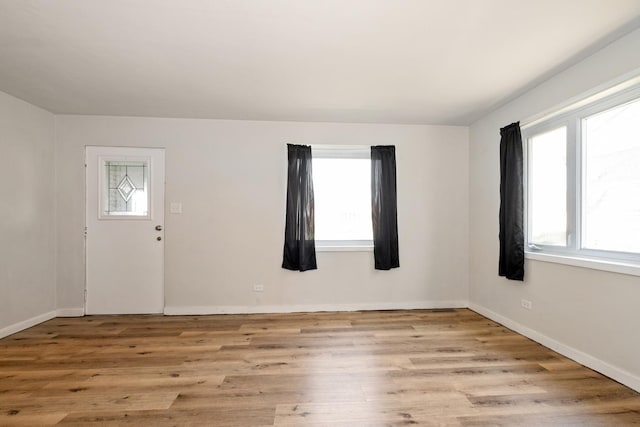 3645 177th Pl, Lansing, IL 60438 - spare room with plenty of natural light and wood finished floors