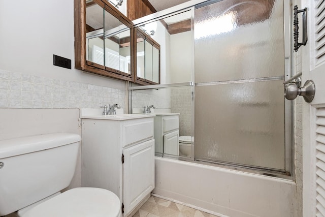 3645 177th Pl, Lansing, IL 60438 - full bathroom with tile walls, vanity, combined bath / shower with glass door, and wainscoting