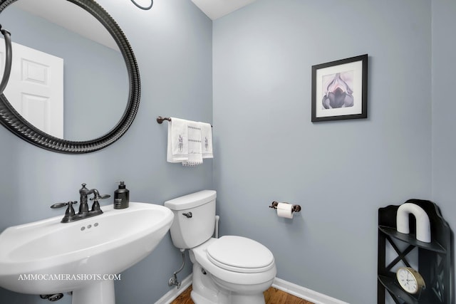 4 Dryden Ct, Algonquin, IL 60102 - half bathroom with a sink and wood finished floors