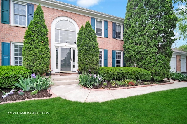 4 Dryden Ct, Algonquin, IL 60102 - view of front of house with brick siding and a front lawn