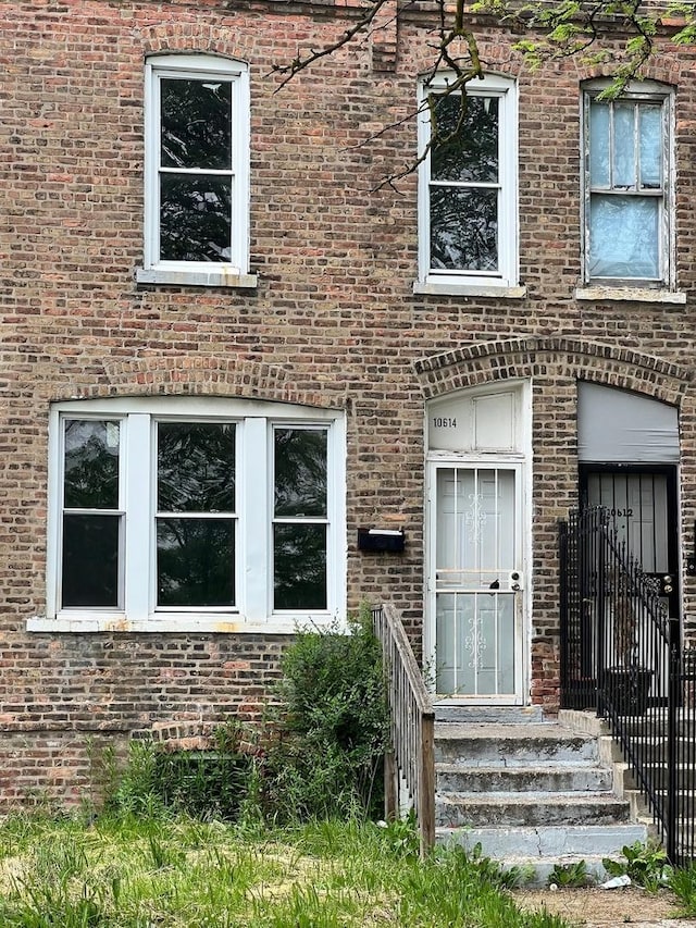 10614 S Langley Ave Unit 10614, Chicago, IL 60628 - view of exterior entry featuring brick siding