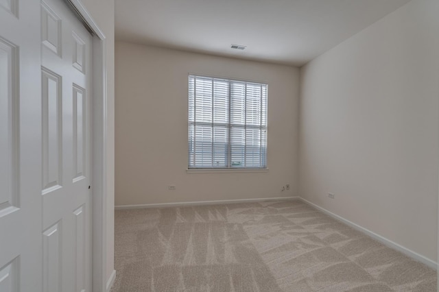 3866 Kingsmill Dr, Elgin, IL 60124 - unfurnished bedroom with light carpet and baseboards