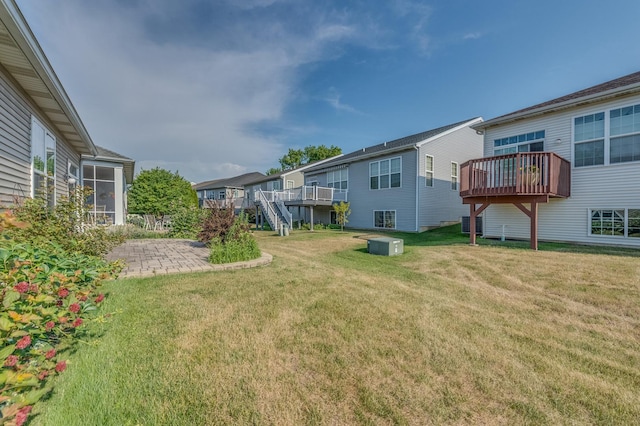 3866 Kingsmill Dr, Elgin, IL 60124 - view of green lawn with a deck and a patio area