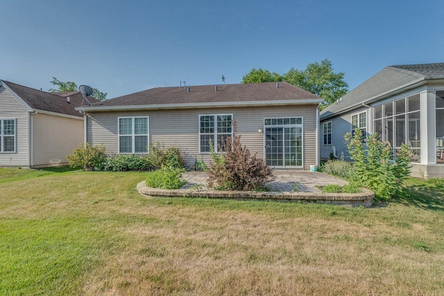 3866 Kingsmill Dr, Elgin, IL 60124 - back of house featuring a patio area and a lawn
