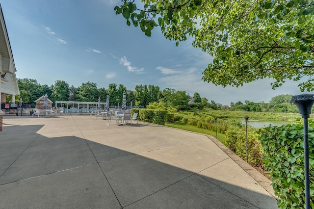 3866 Kingsmill Dr, Elgin, IL 60124 - view of patio featuring a swimming pool and view of scattered trees