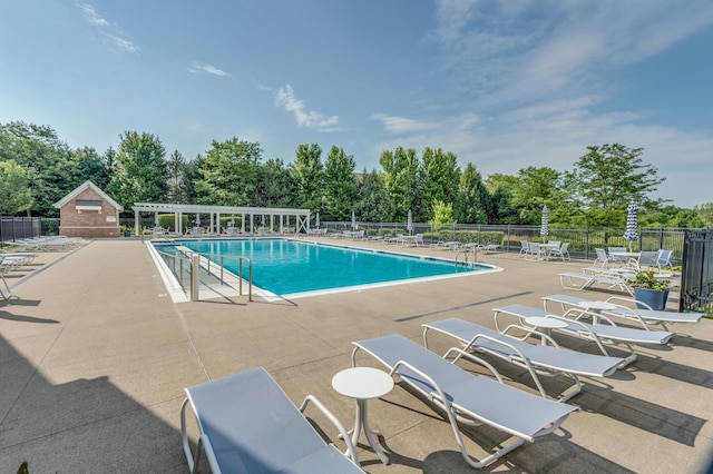 3866 Kingsmill Dr, Elgin, IL 60124 - community pool with a patio and view of scattered trees