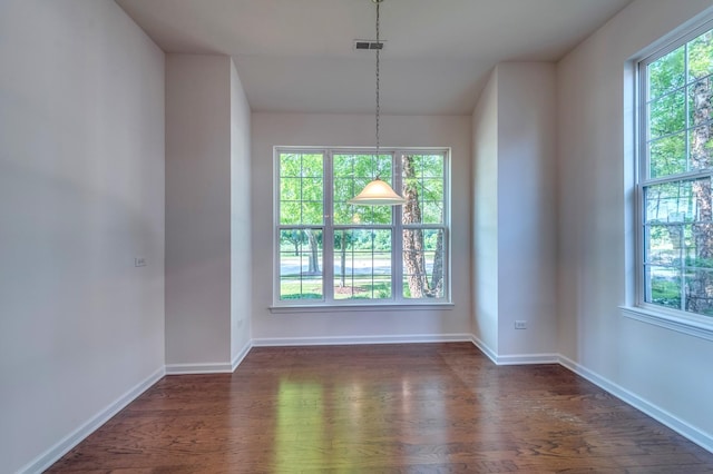 3866 Kingsmill Dr, Elgin, IL 60124 - unfurnished dining area with dark wood-style flooring