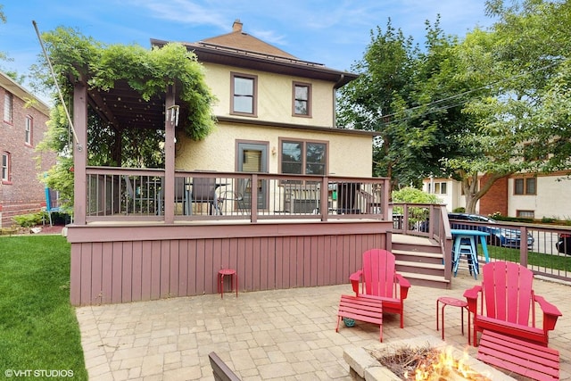 1150 S Oak Park Ave, Oak Park, IL 60304 - back of house with a fire pit, stucco siding, a deck, and a patio