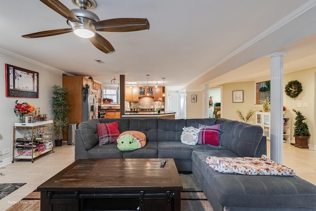 7612 N Rogers Ave Unit G, Chicago, IL 60626 - living room with ceiling fan, ornamental molding, and decorative columns