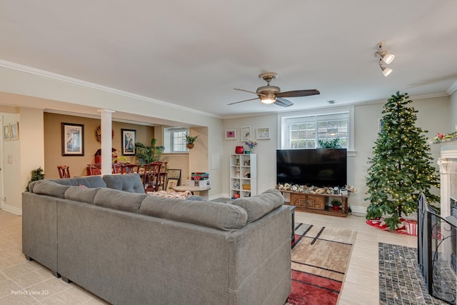 7612 N Rogers Ave Unit G, Chicago, IL 60626 - living area with ornamental molding, a ceiling fan, light tile patterned floors, and ornate columns