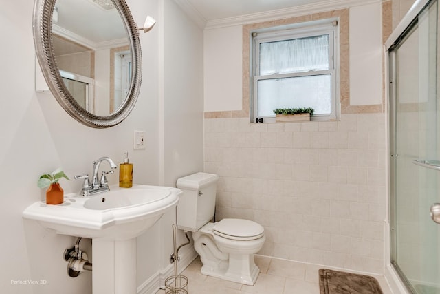 7612 N Rogers Ave Unit G, Chicago, IL 60626 - bathroom featuring tile walls, tile patterned floors, tiled shower, a wainscoted wall, and crown molding