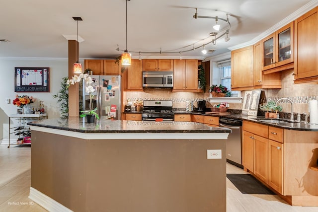 7612 N Rogers Ave Unit G, Chicago, IL 60626 - kitchen with stainless steel appliances, a kitchen island, tasteful backsplash, crown molding, and light tile patterned floors