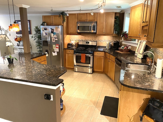 7612 N Rogers Ave Unit G, Chicago, IL 60626 - kitchen featuring stainless steel appliances, tasteful backsplash, brown cabinetry, and ornamental molding