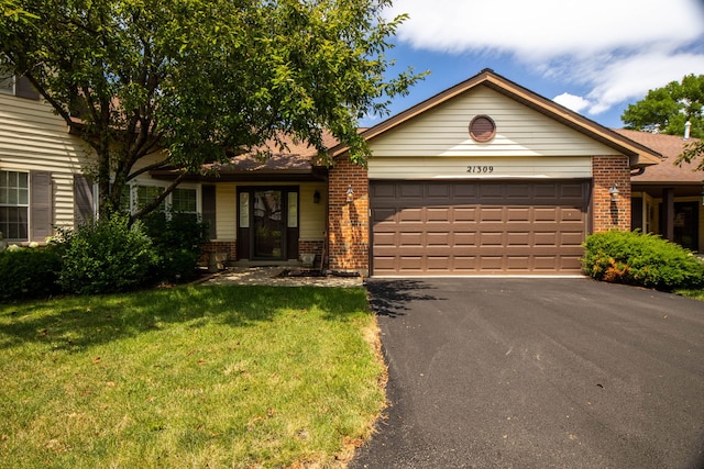 21309 Silktree Cir, Plainfield, IL 60544 - ranch-style house with brick siding, an attached garage, driveway, and a front yard