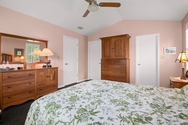 21309 Silktree Cir, Plainfield, IL 60544 - bedroom featuring vaulted ceiling, carpet flooring, and a ceiling fan