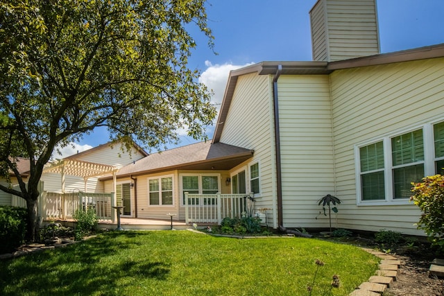 21309 Silktree Cir, Plainfield, IL 60544 - rear view of property with a deck, a chimney, and a lawn