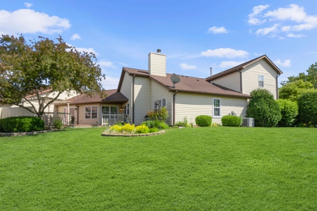 21309 Silktree Cir, Plainfield, IL 60544 - back of property with a chimney and a lawn