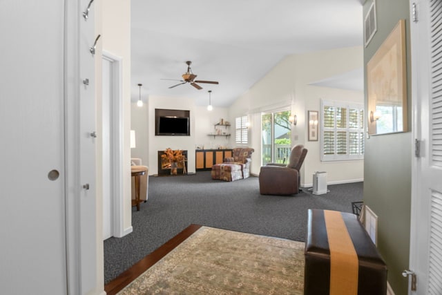 21309 Silktree Cir, Plainfield, IL 60544 - living area featuring ceiling fan, lofted ceiling, and dark colored carpet