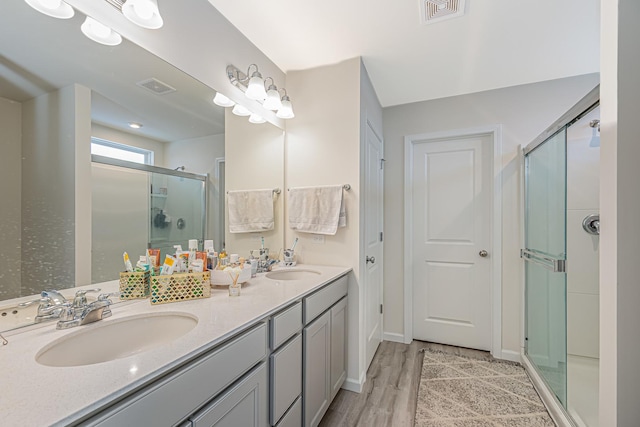 531 Alpine Dr, Algonquin, IL 60102 - full bath with a shower stall, double vanity, and wood finished floors