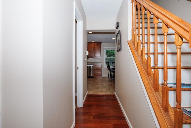 8626 Oakmont Rd, Bloomington, IL 61705 - corridor with stairway and wood finished floors