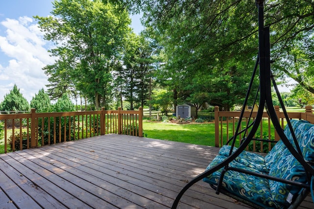 8626 Oakmont Rd, Bloomington, IL 61705 - deck featuring a storage shed and a fenced backyard