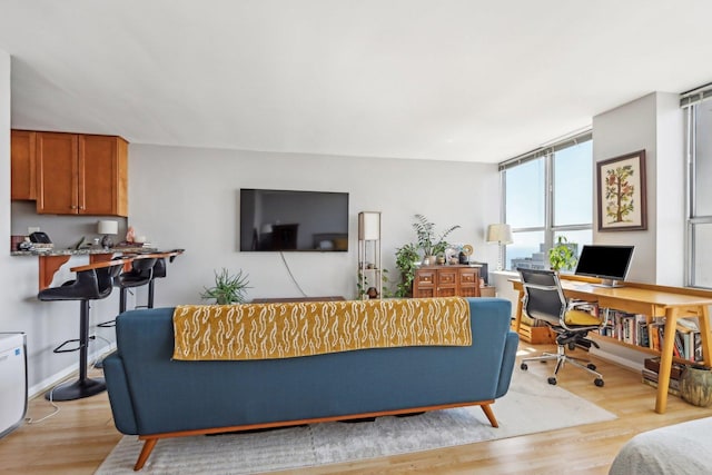 655 W Irving Park Rd Unit 2805, Chicago, IL 60613 - living area with light wood-type flooring and an office area