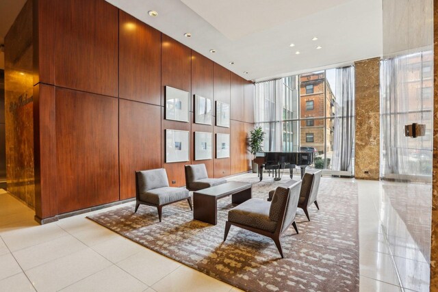 655 W Irving Park Rd Unit 2805, Chicago, IL 60613 - common area with a wall of windows and recessed lighting