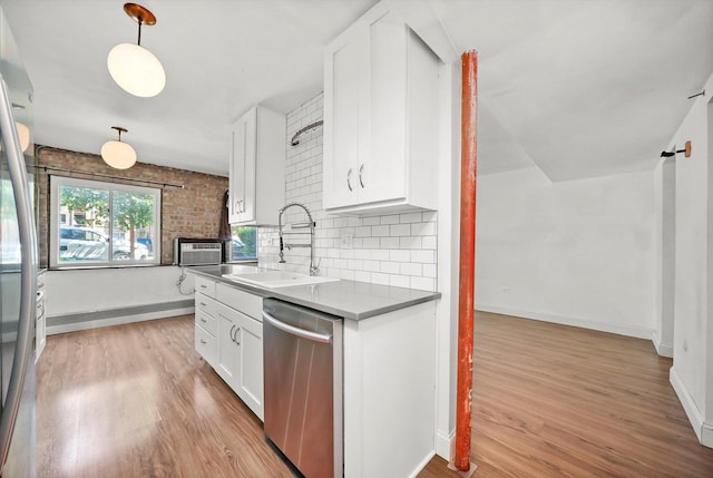 4113 W Cullom Ave Unit 1C, Chicago, IL 60641 - kitchen featuring stainless steel appliances, light wood finished floors, white cabinetry, and decorative backsplash