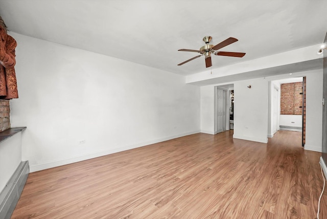 4113 W Cullom Ave Unit 1C, Chicago, IL 60641 - unfurnished living room featuring a ceiling fan and wood finished floors