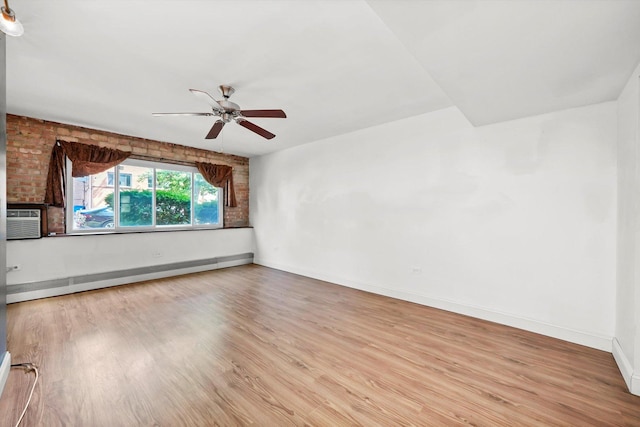 4113 W Cullom Ave Unit 1C, Chicago, IL 60641 - unfurnished room featuring ceiling fan, a baseboard radiator, and light wood finished floors