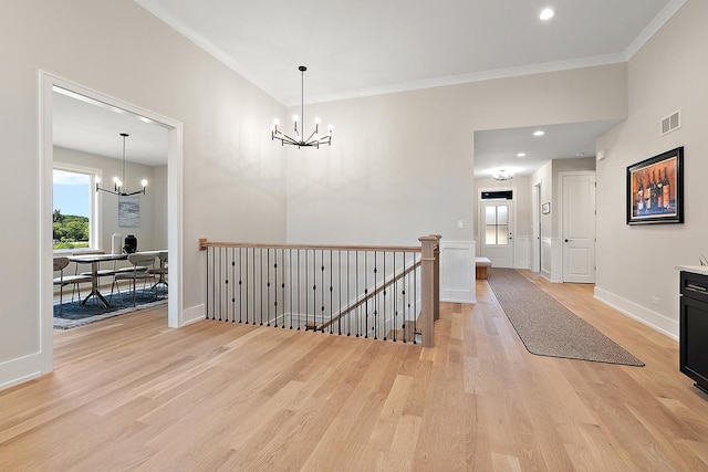 11155 Lizmore Ln Unit 35B, Orland Park, IL 60467 - corridor with a chandelier, light wood finished floors, an upstairs landing, crown molding, and recessed lighting
