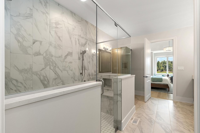 11155 Lizmore Ln Unit 35B, Orland Park, IL 60467 - ensuite bathroom with marble look tile flooring and a marble finish shower
