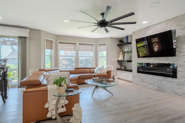 1814 Loblolly Dr, Normal, IL 61761 - living room with a ceiling fan, wood finished floors, a fireplace, and recessed lighting