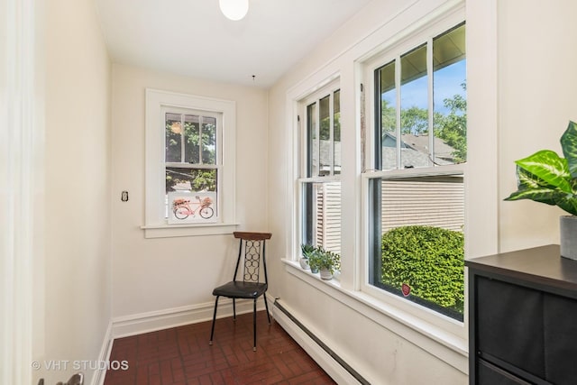 1620 Hyde Park Ave, Waukegan, IL 60085 - sitting room featuring brick patterned floors and baseboard heating