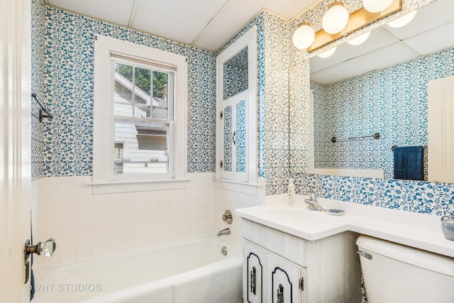 1620 Hyde Park Ave, Waukegan, IL 60085 - full bathroom with wallpapered walls, a bath, vanity, and wainscoting