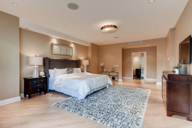 270 E Pearson St Unit 1402, Chicago, IL 60611 - bedroom with light wood finished floors and recessed lighting