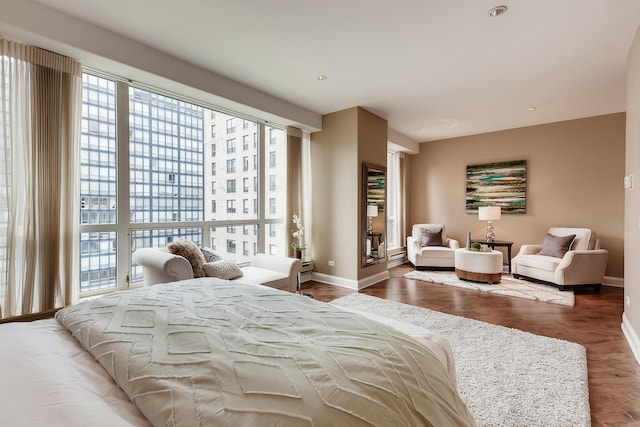270 E Pearson St Unit 1402, Chicago, IL 60611 - bedroom with baseboards and wood finished floors