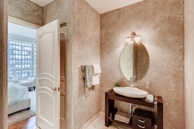 270 E Pearson St Unit 1402, Chicago, IL 60611 - bathroom featuring a sink and ensuite bath
