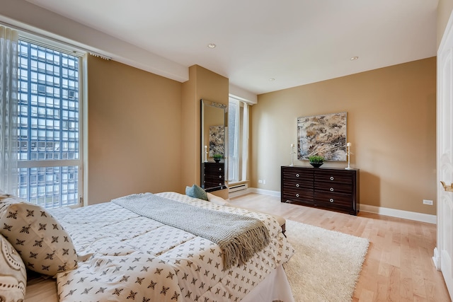 270 E Pearson St Unit 1402, Chicago, IL 60611 - bedroom with light wood-type flooring and baseboards