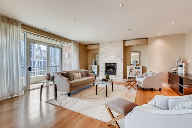 270 E Pearson St Unit 1402, Chicago, IL 60611 - living area with wood finished floors and a fireplace
