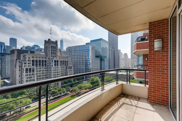 270 E Pearson St Unit 1402, Chicago, IL 60611 - balcony featuring a skyline view