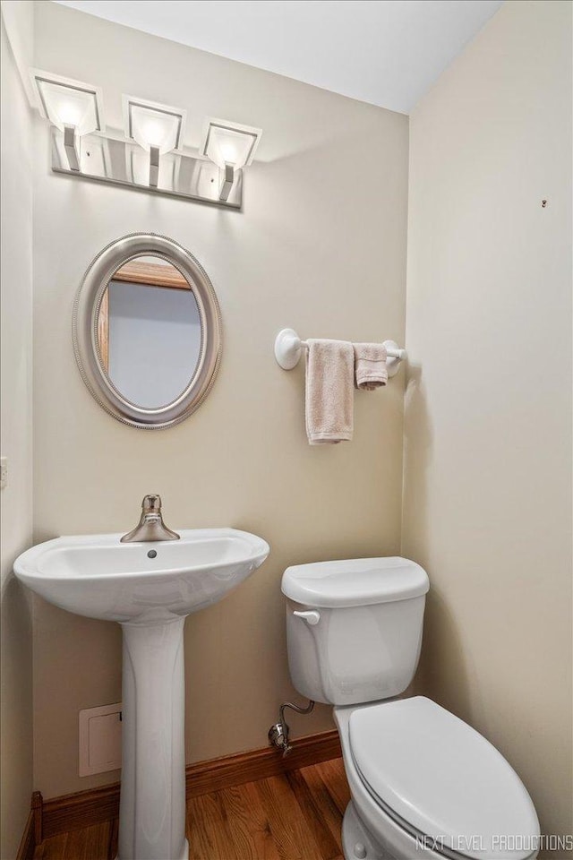 504 Fellows St, Saint Charles, IL 60174 - half bath featuring wood finished floors