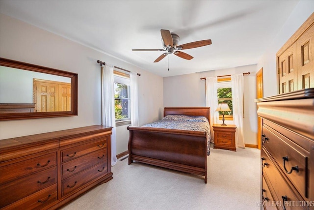 504 Fellows St, Saint Charles, IL 60174 - bedroom with multiple windows, light colored carpet, and a ceiling fan