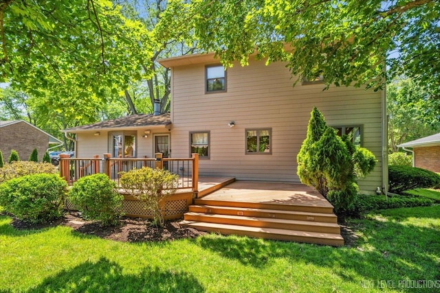 504 Fellows St, Saint Charles, IL 60174 - rear view of house with a lawn and a deck