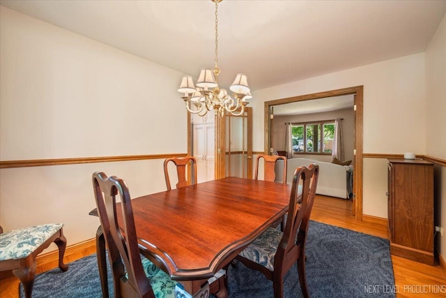 504 Fellows St, Saint Charles, IL 60174 - dining room featuring a chandelier and light wood-type flooring