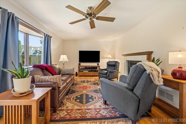 504 Fellows St, Saint Charles, IL 60174 - living area with ceiling fan, wood finished floors, and a fireplace